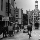 Market Cross, Chichester: Tommy rides past the clocktower en-route to another massive daily total